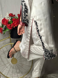Elegant White Silk 3-Piece Suit with Black Embroidery & Red Dupatta