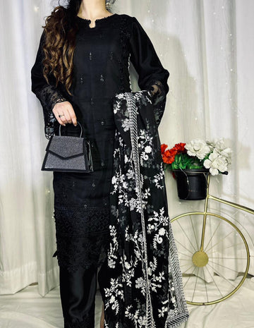 Exquisite Black Georgette Embroidered Suit with Moti Work & Heavy Floral Dupatta