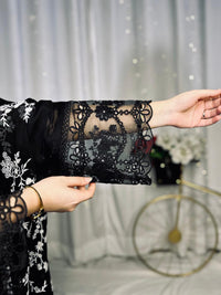 Exquisite Black Georgette Embroidered Suit with Moti Work & Heavy Floral Dupatta